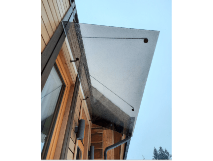 Стеклянный козырек бронзового цвета на креплениях фото