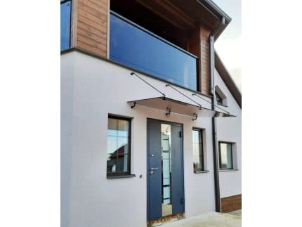 Козырек стеклянный с бескаркасным вантовым крепежом фото